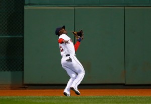 BOSTON, MA - SEPTEMBER 25: Rusney Castillo #38 of the Boston Red Sox makes a catch in center field in the sixth inning against the Tampa Bay Rays during the game at Fenway Park on September 25, 2014 in Boston, Massachusetts.  (Photo by Jared Wickerham/Getty Images)