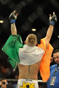 conor mcgregor celebrates ufc 178 win with irish flag