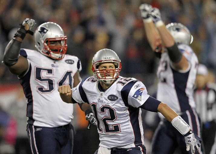 Tom Brady #12 of the New England Patriots reacts after the game-winning touchdown in the fourth quarter against the Dallas Cowboys at Gillette Stadium on October 16, 2011 in Foxboro, Massachusetts.