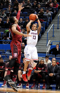 Connecticut Huskies guard Shabazz Napier (13) scored 15 points in the first half against Temple at the XL Center.