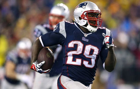  LeGarrette Blount #29 of the New England Patriots runs a 73 yard touchdown in the fourth quarter against the Indianapolis Colts during the AFC Divisional Playoff game at Gillette Stadium on January 11, 2014 in Foxboro, Massachusetts.