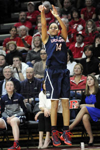 UConn Huskies guard Bria Hartley hoists a three-pointer in the second half at the Rutgers Athletic Center Sunday.