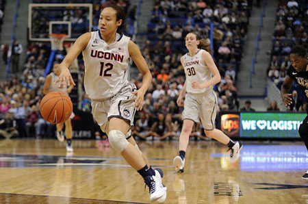 Connecticut Huskies guard Saniya Chong (12) steals the ball during the first half against the University of Central Florida at the XL Center Wednesday night in Hartford.