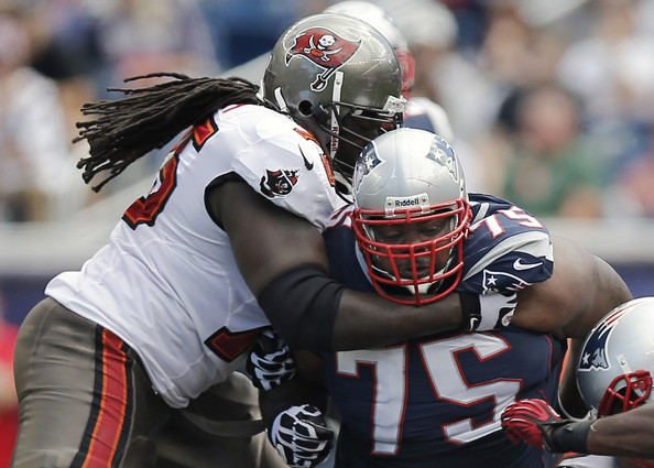  Vince Wilfork #75 of the New England Patriots takes on a blocker during the second half of their 23-3 win over the Tampa Bay Buccaneers at Gillette Stadium on September 22, 2013 in Foxboro, Massachusetts. 
