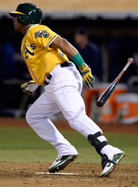  Yoenis Cespedes #52 of the Oakland Athletics hits a single in the fifth inning against the Detroit Tigers during Game Two of the American League Division Series at O.co Coliseum on October 5, 2013 in Oakland, California. 