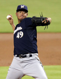  Pitcher Yovani Gallardo #49 of the Milwaukee Brewers throws against the Miami Marlins during the first inning at Marlins Park on June 10, 2013 in Miami, Florida. 