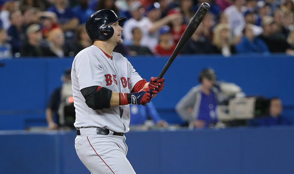  A.J. Pierzynski #40 of the Boston Red Sox hits a grand slam home run in the third inning during MLB game action against the Toronto Blue Jays on April 26, 2014 at Rogers Centre in Toronto, Ontario, Canada. 