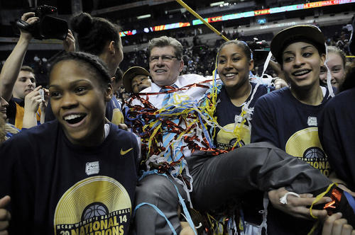  Connecticut Huskies head coach Geno Auriemma is carried of the court by Connecticut Huskies guard Moriah Jefferson (4), Connecticut Huskies center Kiah Stokes (41), Connecticut Huskies guard Brianna Banks (13)Connecticut Huskies forward Kaleena Mosqueda-Lewis (23) and Connecticut Huskies guard Bria Hartley (14) after UConn defeated Notre Dame 79-58 for the 2014 NCAA Women's National Championship in Nashville, TN., Tuesday night at the Bridgestone arena. 