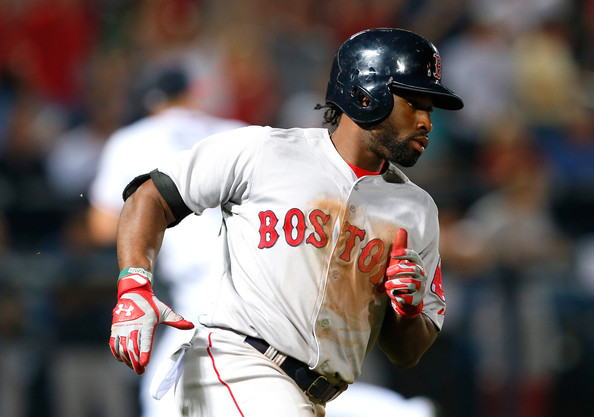  Jackie Bradley Jr. #25 of the Boston Red Sox hits a two-run single in the seventh inning against the Atlanta Braves at Turner Field on May 27, 2014 in Atlanta, Georgia. 
