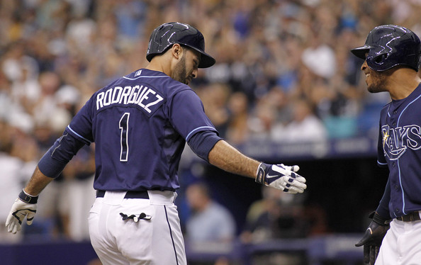  Sean Rodriguez #1 of the Tampa Bay Rays celebrates with Desmond Jennings (R) of the Tampa Bay Rays after both scoring off of a three-run home run by Rodriguez during the seventh inning of a game against the Boston Red Sox on May 25, 2014 at Tropicana Field in St. Petersburg, Florida. 