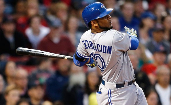  Edwin Encarnacion #10 of the Toronto Blue Jays hits his second home run against the Boston Red Sox in the third inning at Fenway Park on May 21, 2014 in Boston, Massachusetts. 