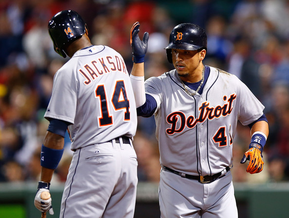  Victor Martinez #41 of the Detroit Tigers is congratulated by teammate Austin Jackson #14 after hitting a two-run home run in the third inning against the Boston Red Sox during the game at Fenway Park on May 18, 2014 in Boston, Massachusetts. 