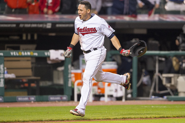 Asdrubal Cabrera #13 of the Cleveland Indians celebrates after hitting a walk-off three run home run during the twelfth inning against the Boston Red Sox at Progressive Field on June 5, 2014 in Cleveland, Ohio.