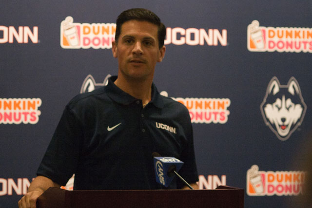 UConn Huskies head football coach Bob Diaco listens to a question from the media during UConn's media day on August 21, 2014 at the Burton Family Football Complex.