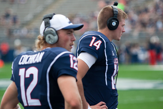 The focus is now on UConn Huskies QB #14 Tim Boyle with #12 Casey Cochran retiring from football.
