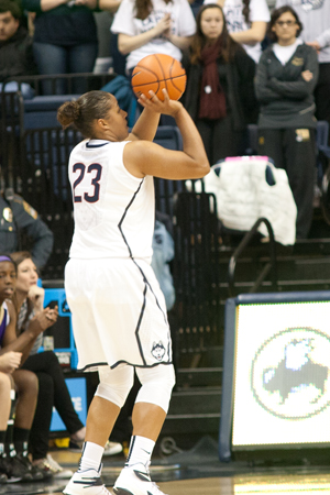 Kaleena Mosqueda-Lewis attempts a three-pointer against West Chester at Gampel Pavilion on November 2, 2014.