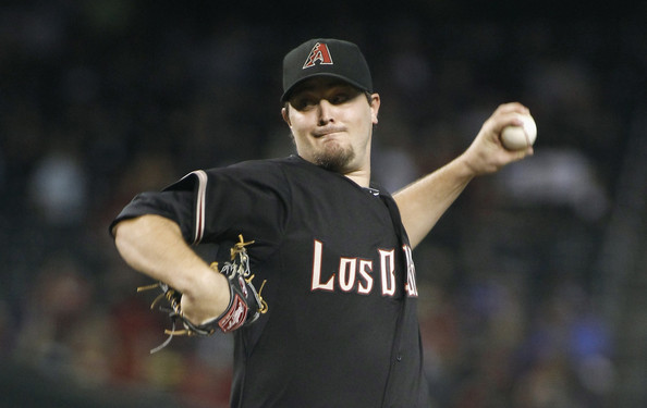  Starting pitcher Wade Miley #36 of the Arizona Diamondbacks delivers a pitch against the St Louis Cardinals during the first inning of a MLB game at Chase Field on September 27, 2014 in Phoenix, Arizona. 