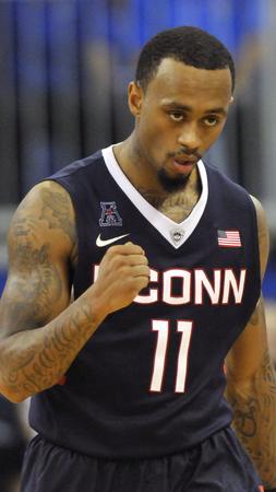 UConn guard Ryan Boatright reacts at the conclusion of the Huskies' win at Florida Saturday afternoon.