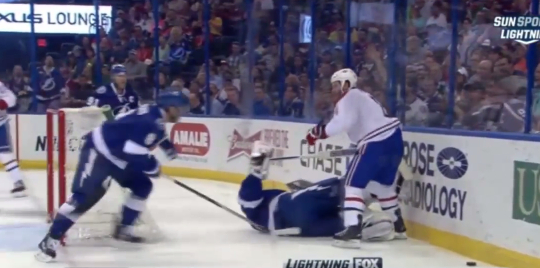 Brandon Prust checked Ben Bishop into the boards